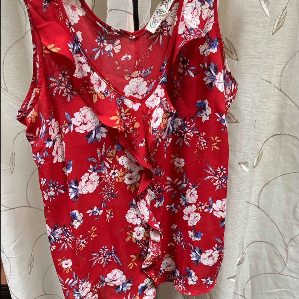 Sleeveless ruffle neck blouse